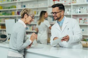 Pharmacist Helping Customer